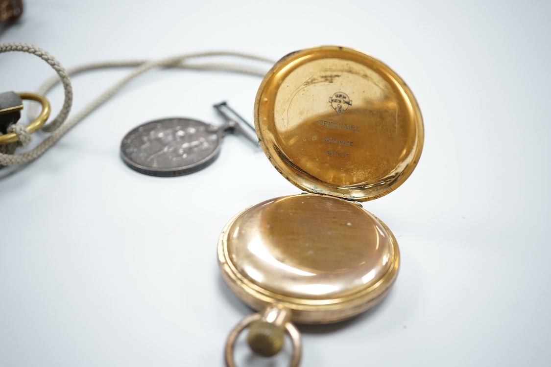 A cased WWI compass, an RG watch and a medal awarded to 33486 PTE. N. FRANCE. LING. R.